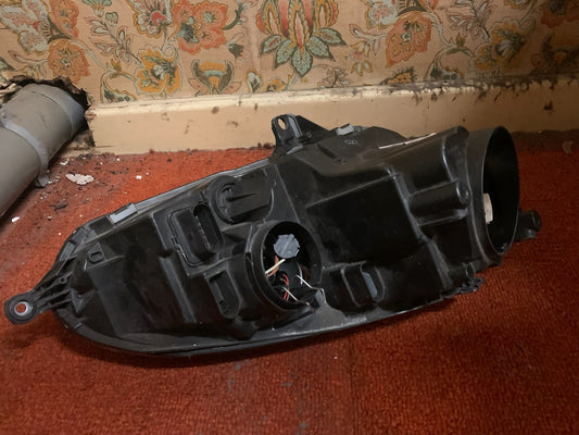 Phare avant gauche pour VOLKSWAGEN GOLF V Fond gris