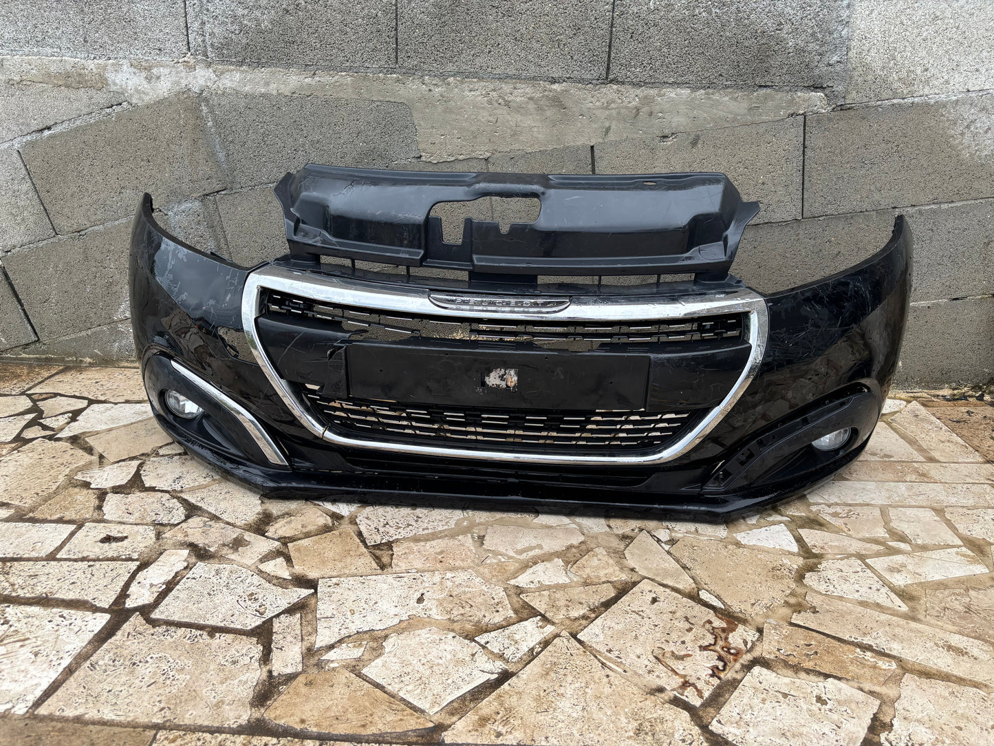 Pare choc avant Peugeot 208 1 phase 2 noir