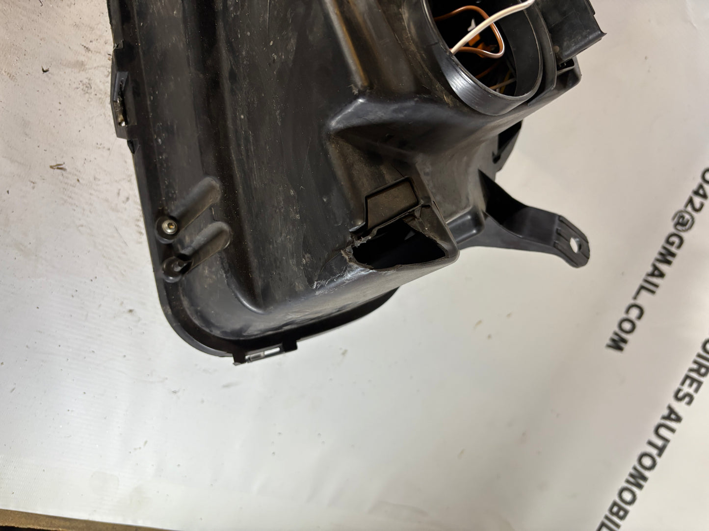Phare avant gauche Dacia Duster phase 1 fond noir