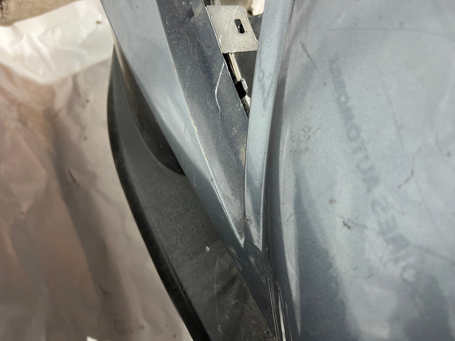 Pare chocs avant Peugeot 207 gris